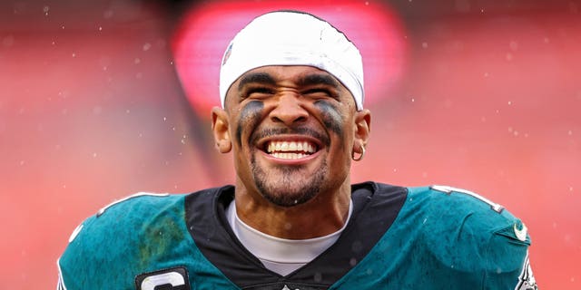 Quarterback Jalen Hurts, #1 of the Philadelphia Eagles, celebrates after defeating the Washington Commanders at FedExField on Sept. 25, 2022 in Landover, Maryland.