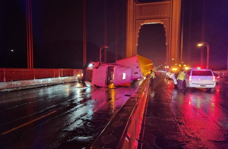 Tractor trailer toppled by violent winds on rain-soaked Golden Gate Bridge