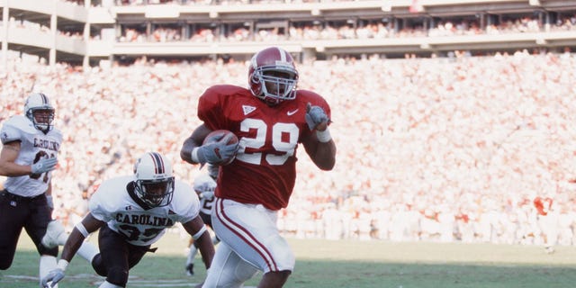 Ahmaad Galloway of the Alabama Crimson Tide runs with the ball against the South Carolina Gamecocks Sept. 30, 2000.