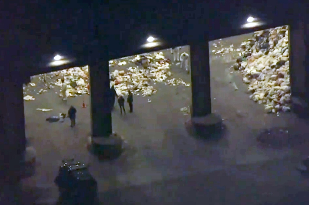  Investigators could be seen sorting through trash at a transfer station in Peabody on Monday night.