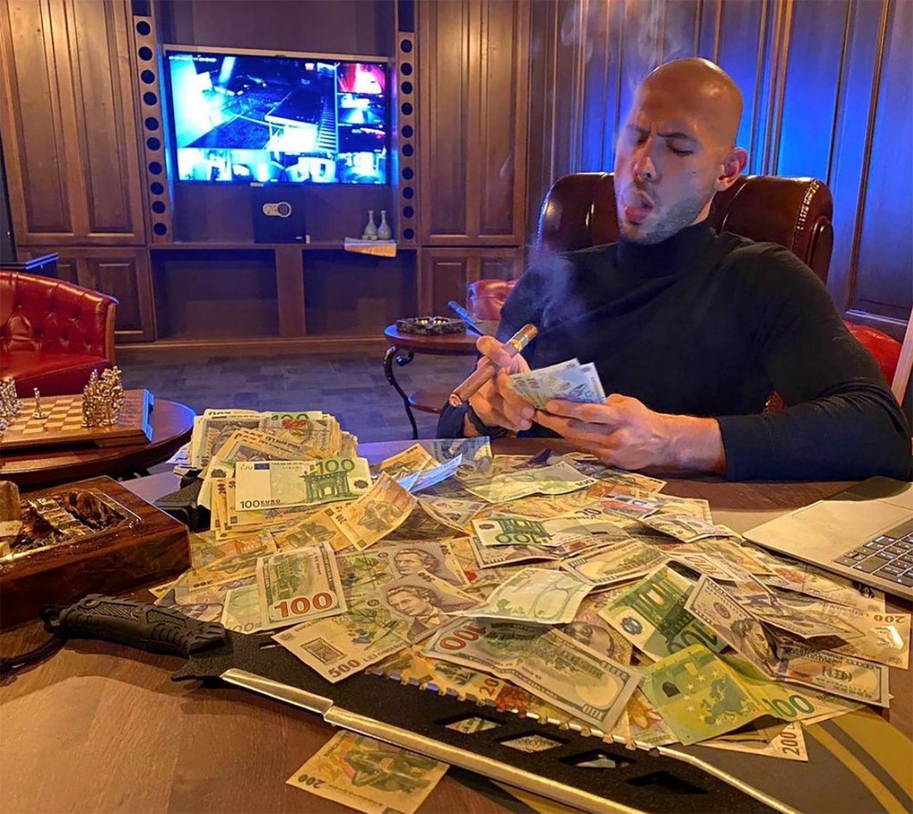 Social media image shows Andrew Tate smoking a cigar and counting his money at home Romania home.
