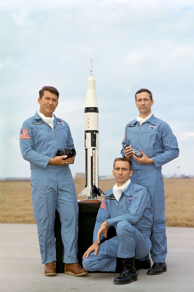 A portrait of the Apollo-Saturn 7 crew members. They are, left to right, astronauts Walter M. Schirra Jr., commander; Walter Cunningham, lunar module pilot; and Donn F. Eisele.