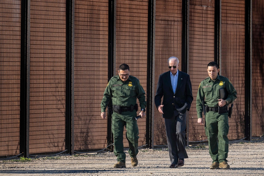 President Joe Biden speaks with US Customs and Border Protection officers as he visits the US-Mexico border in El Paso, Texas, on January 8.