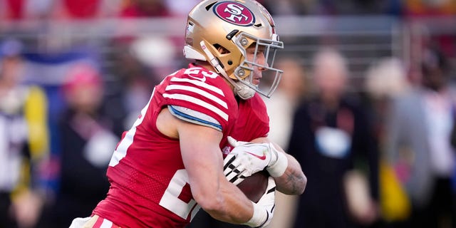 Christian McCaffrey #23 of the San Francisco 49ers carries the ball against the Dallas Cowboys during the first quarter in the NFC Divisional Playoff game at Levi's Stadium on January 22, 2023 in Santa Clara, California.