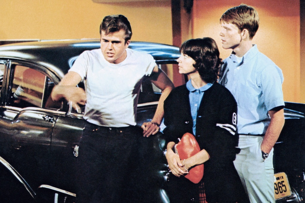 Paul Le Mat, Cindy Williams "Happy Days" star Ron Howard in a scene from the 1973 film classic "American Graffiti."