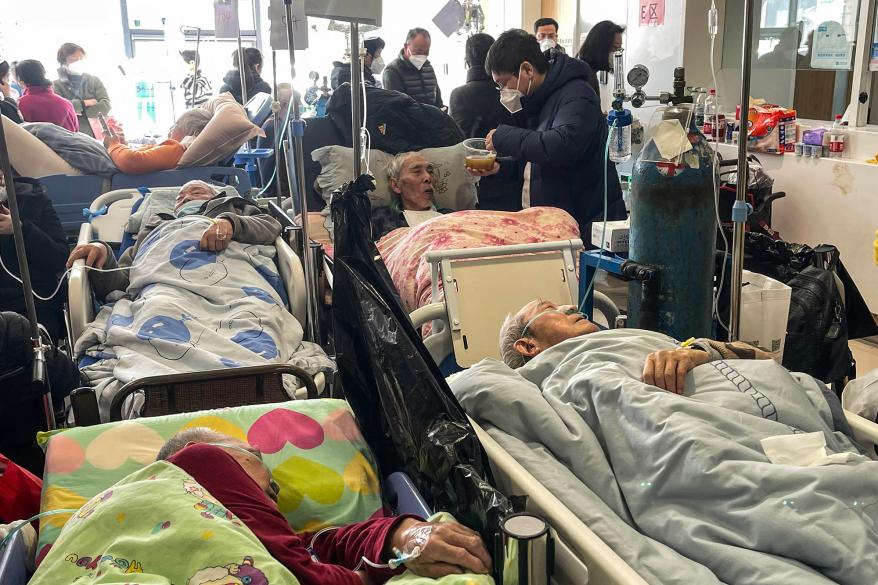 Patients on stretchers are seen at Tongren hospital in Shanghai.