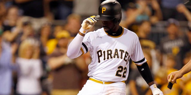 Andrew McCutchen of the Pittsburgh Pirates reacts after hitting a solo home run in the seventh inning during a game against the Milwaukee Brewers at PNC Park Sept. 3, 2016, in Pittsburgh.  