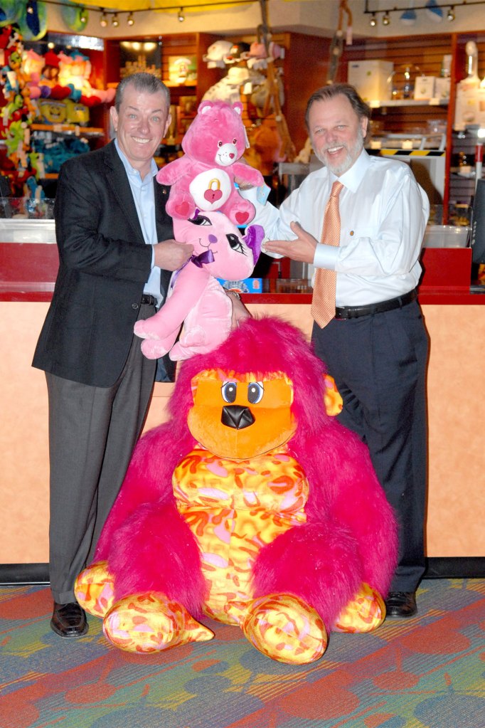 Founders of Dave & Buster's — Dave Corriveau (left) and Buster Corley — pose together in a photo.
