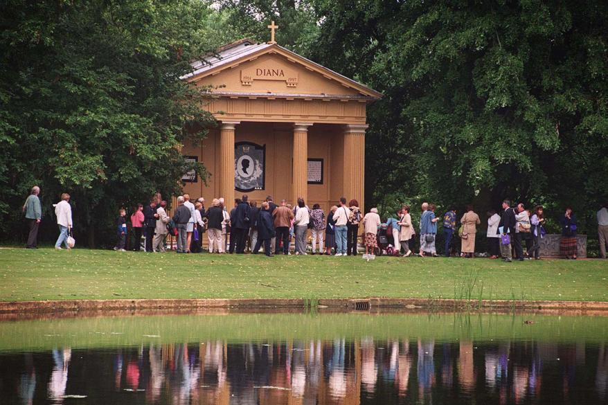 Crowds queue to enter the Doric Temple dedicated to the memory of Diana, Princess of Wales at Althorp House, the Spencer family estate, on July 01, 1998