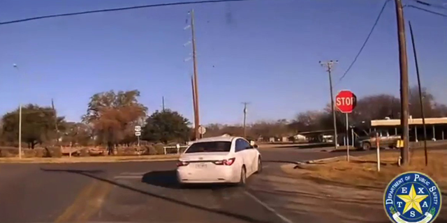 A local police department deployed a tire deflation device, which flattened the car's two front tires and brought the vehicle to a stop. 