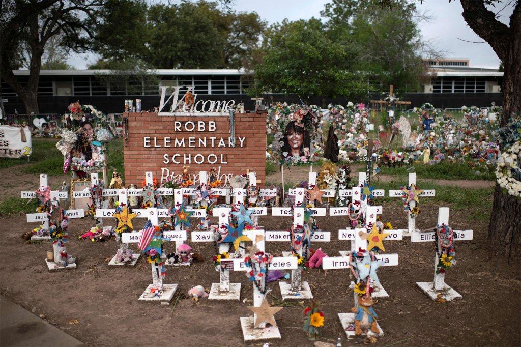 Crosses set up to honor those who lost their lives during the Robb Elementary School shooting in Uvalde, Texas are shown.