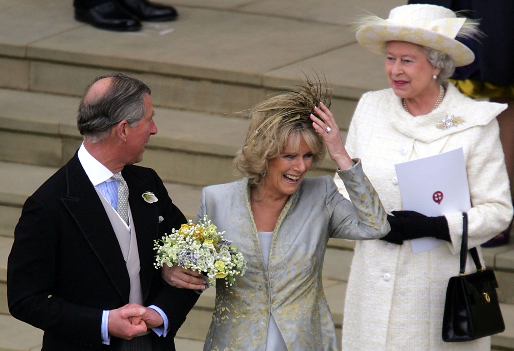 The then-Prince Charles, Camilla and Queen Elizabeth II eave the Service of Prayer and Dedication following their marriage at The Guildhall, at Windsor Castle on April 9, 2005.