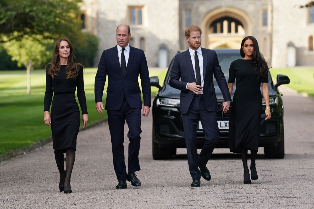 WINDSOR, ENGLAND - SEPTEMBER 10: Catherine, Princess of Wales, Prince William, Prince of Wales, Prince Harry, Duke of Sussex, and Meghan, Duchess of Sussex on the long Walk at Windsor Castle on September 10, 2022 in Windsor, England. Crowds have gathered and tributes left at the gates of Windsor Castle to Queen Elizabeth II, who died at Balmoral Castle on 8 September, 2022. (Photo by Kirsty O'Connor - WPA Pool/Getty Images)