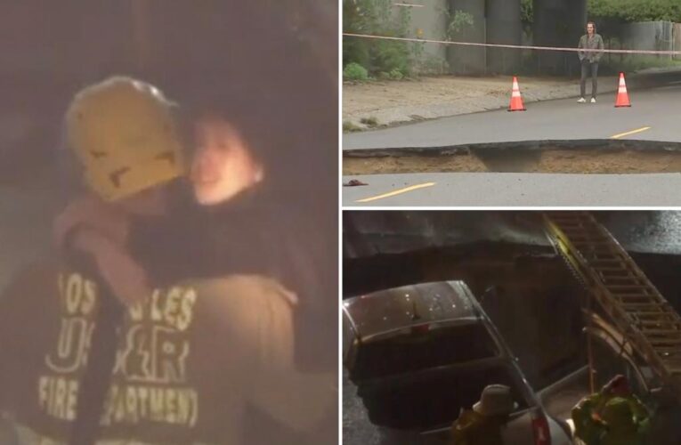 2 rescued after car swallowed by massive California sinkhole