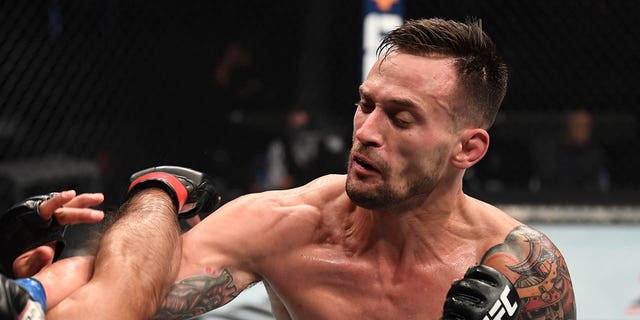 James Krause punches Claudio Silva of Brazil in their welterweight bout during the UFC Fight Night event inside Flash Forum on UFC Fight Island on October 18, 2020 in Abu Dhabi, United Arab Emirates.