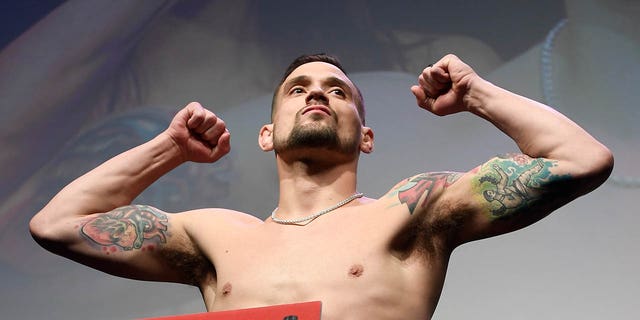 James Krause poses on the scale during the UFC 247 ceremonial weigh-in at the Toyota Center on February 7, 2020 in Houston, Texas.