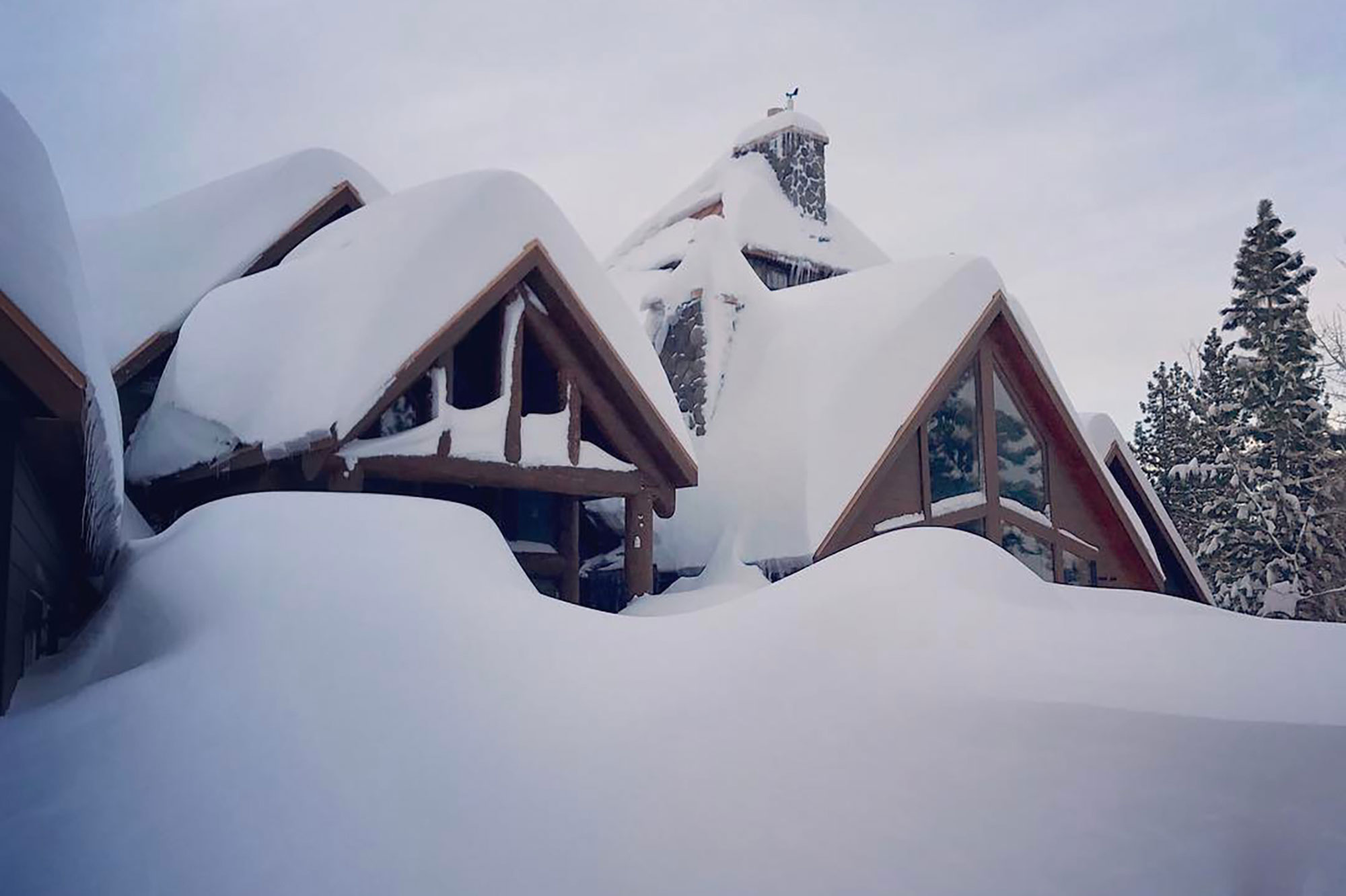 Renner's home buried in snow. 