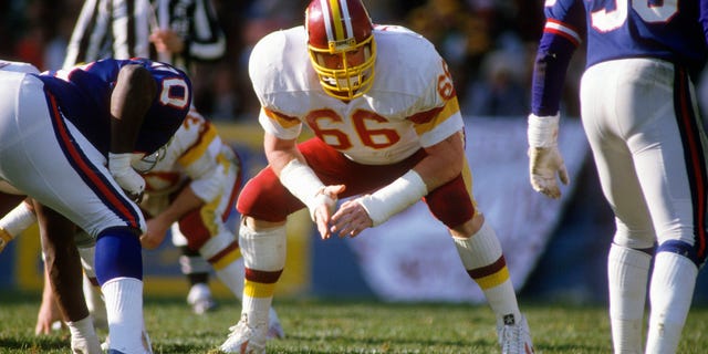 Joe Jacoby #66 of the Washington Redskins in action against the New York Giants during an NFL football game September 16, 1984 at RFK Memorial Stadium in Washington, D.C.. Jacoby played for the Redskins from 1981-93.