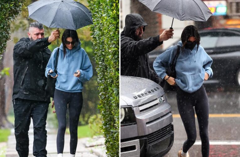 Kendall Jenner’s umbrella escort slammed by fans: ‘So out of touch’