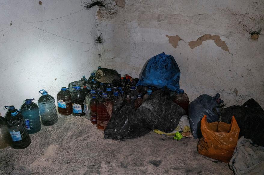 Human excrements are seen inside a basement of an office building where people were allegedly detained and tortured.