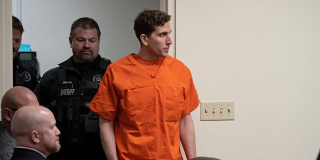 Bryan Kohberger, right, who is accused of killing four University of Idaho students in November 2022, is escorted into a courtroom for a hearing in Latah County District Court, Thursday, Jan. 5, 2023, in Moscow, Idaho.