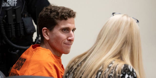 Bryan Kohberger, left, who is accused of killing four University of Idaho students in November 2022, looks toward his attorney, public defender Anne Taylor, right, during a hearing in Latah County District Court, Thursday, Jan. 5, 2023, in Moscow, Idaho. 