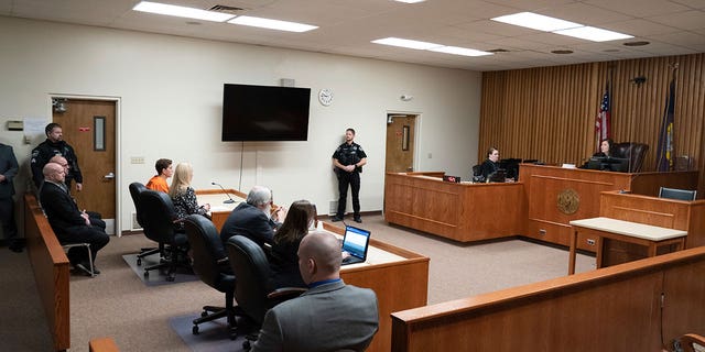 Bryan Kohberger, seated next to his attorney at the left table, who is accused of killing four University of Idaho students in November 2022, appears before Latah County Magistrate Judge Megan Marshall, right, during a hearing in Latah County District Court, Thursday, Jan. 5, 2023, in Moscow, Idaho. 