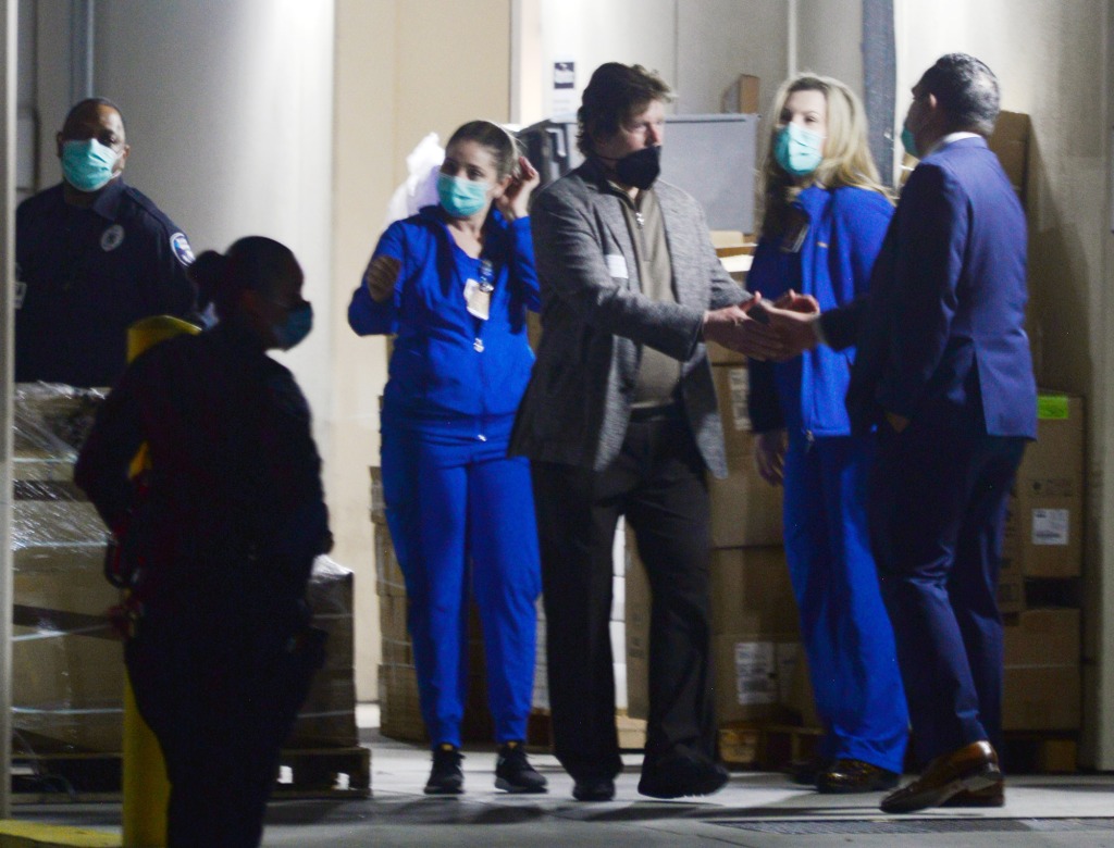 Jerry Schilling, manager of Lisa Marie Presley thanks hospital staff as he and Priscilla Presley leave the West Hills Medical Center Emergency room in West Hills, Ca following her death.