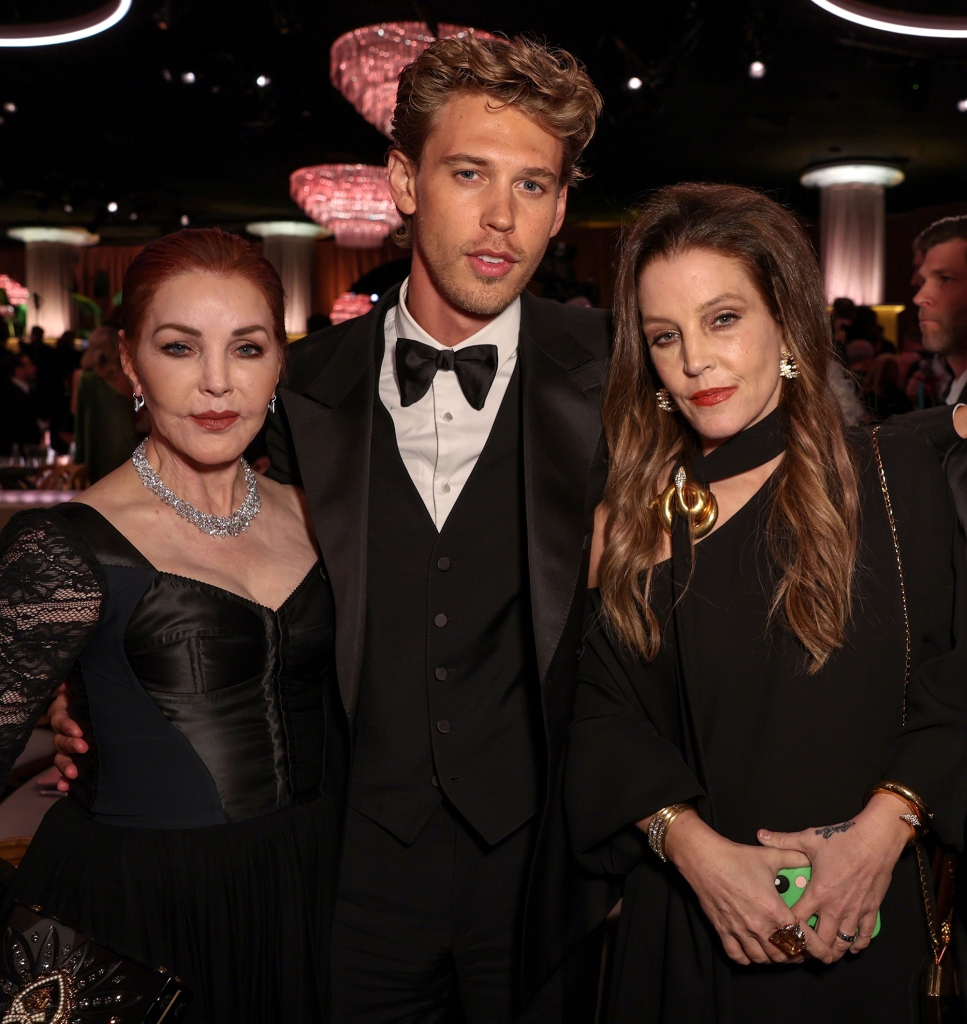 Priscilla Presley, Austin Butler and Lisa Marie Presley on Jan 10 at the Golden Globes, standing in a ballroom. 