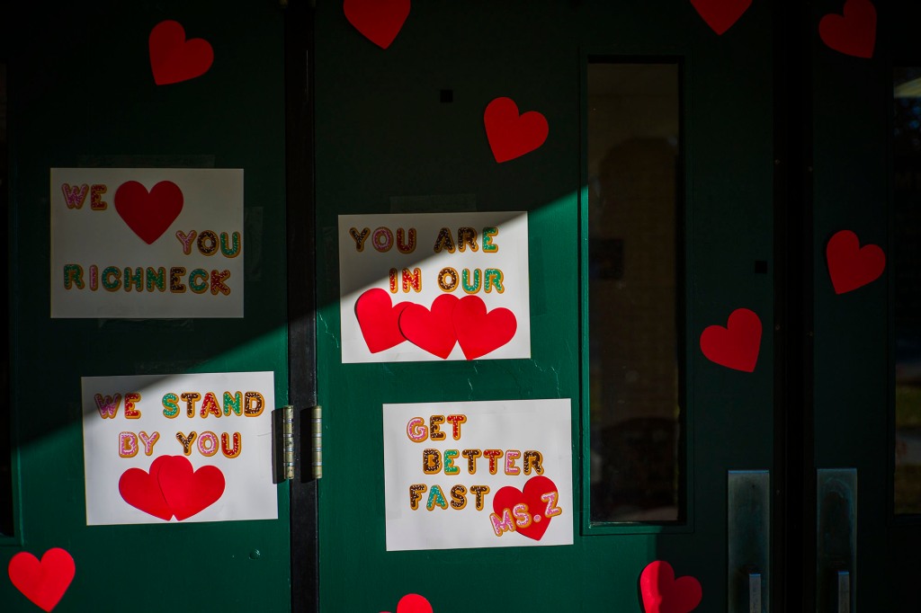 Messages of support for teacher Abby Zwerner on the doors of Richneck Elementary.