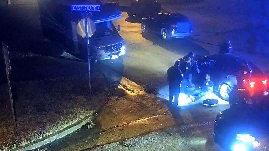 Tyre Nichols, a 29-year-old Black man who was pulled over while driving and died three days later, sits against a police car after being beaten by Memphis Police Department officers on January 7, 2023, in this still image from video released by Memphis Police Department on January 27, 2023.