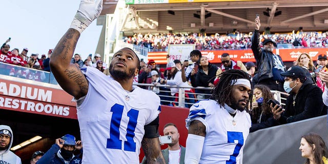 Dallas Cowboys linebacker Micah Parsons (11) and Dallas Cowboys cornerback Trevon Diggs (7) walk onto the field before the NFL NFC Divisional Playoff game between the Dallas Cowboys and San Francisco 49ers on January 22, 2023, at Levi's Stadium in Santa Clara, CA.