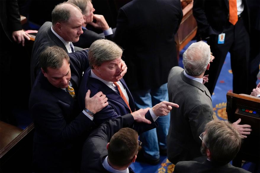 Rep. Richard Hudson, R-N.C., left, pulls Rep. Mike Rogers, R-Ala., back as they talk with Rep. Matt Gaetz, R-Fla.