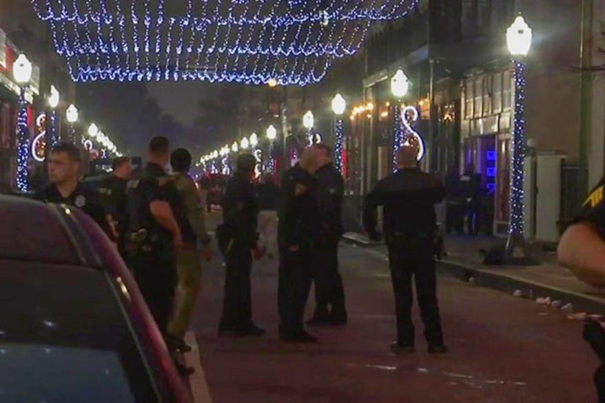 Law enforcement agencies in Mobile, Ala. gather downtown after a deadly shooting.
