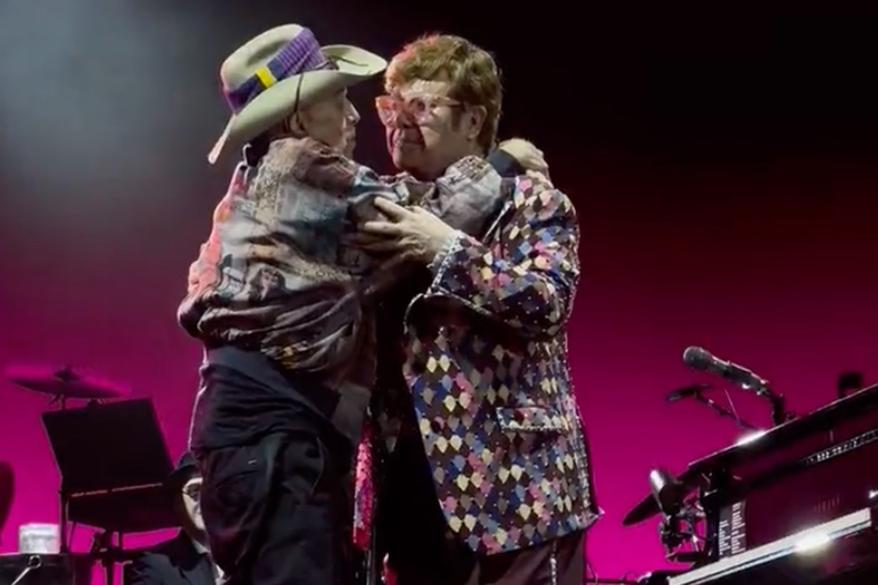 Elton John's longtime friend, Ian "Molly" Meldrum, met up with the legendary singer on stage.