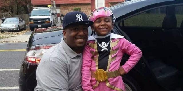 Kenneth Withers and his daughter Nadira Withers pose for a picture before she was murdered in August 2017.