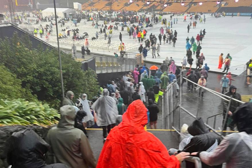 Fans leave Mt Smart Stadium in Auckland, New Zealand, Friday, Jan. 27, 2023, where about 40,000 people were expected to attend an Elton John concert.