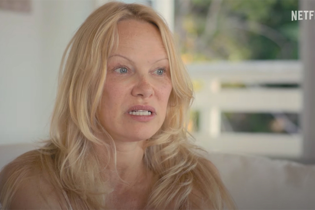 Pamela Anderson without makeup looking serious. 