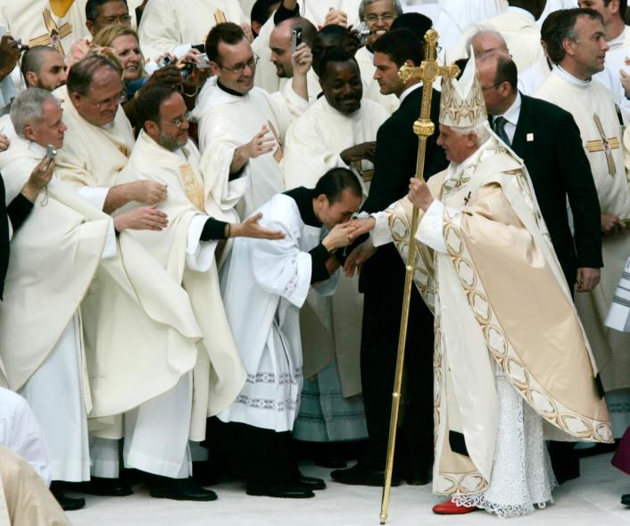 Pope Benedict XVI greeting priests at Yankee Stadium.