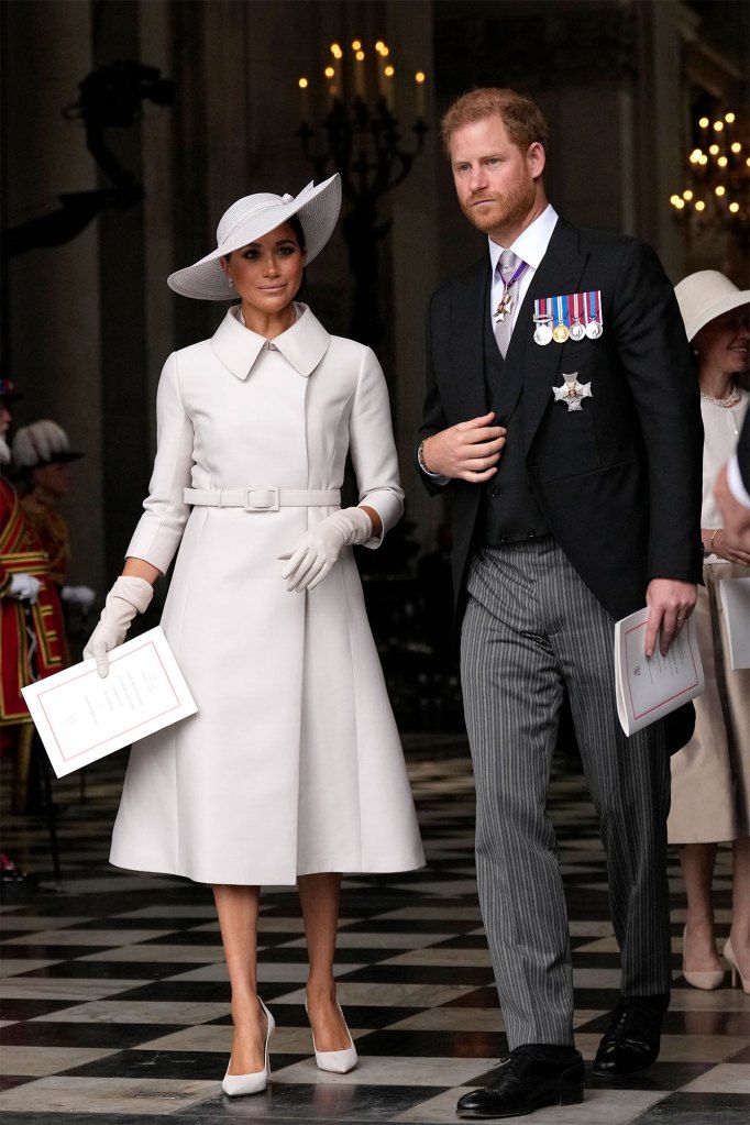 Prince Harry and Meghan Markle, Duke and Duchess of Sussex leave after a service of thanksgiving for the reign of Queen Elizabeth II at St Paul's Cathedral in London, Friday, June 3, 2022