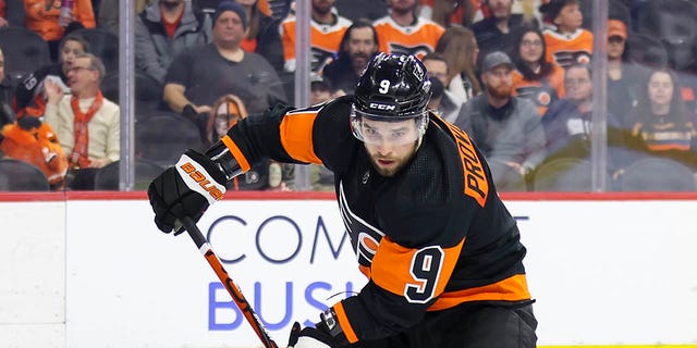 Ivan Provorov #9 of the Philadelphia Flyers skates with the puck past Max Jones #49 of the Anaheim Ducks during the third period at Wells Fargo Center on January 17, 2023 in Philadelphia, Pennsylvania.