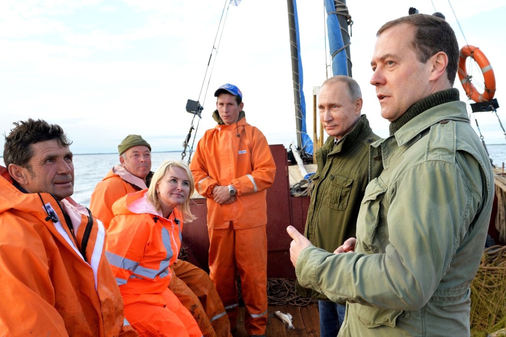 Putin on a boat with fishermen