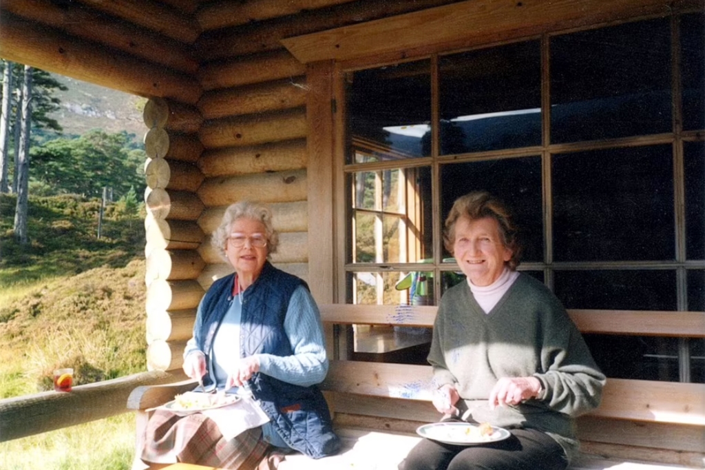 UNDATED: The Queen and her cousin Margaret Rhodes enjoy lunch at her log cabin in Glen Beg, on the Balmoral estate. The Queen drinks a gin and Dubonnet, by her side.