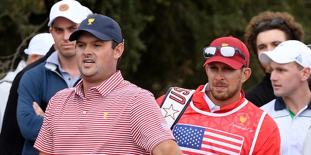 Patrick Reed looks for a potential shot during the President's Cup golf tournament at Royal Melbourne Golf Club in Melbourne on Dec. 12, 2019.