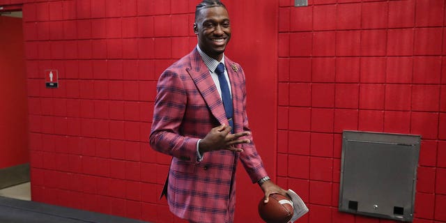 Robert Griffin III is seen prior to the game between the Michigan Wolverines and the TCU Horned Frogs in the Vrbo Fiesta Bowl at State Farm Stadium on December 31, 2022 in Glendale, Arizona.