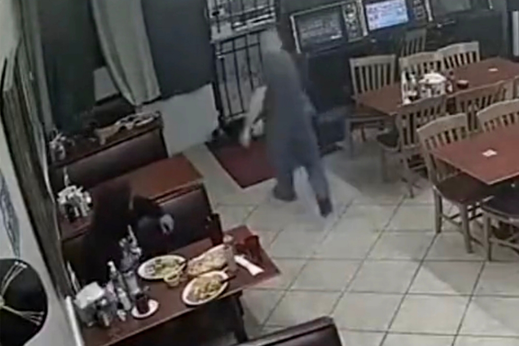 A customer draws a gun and shoots at an armed robber at a Houston taqueria.