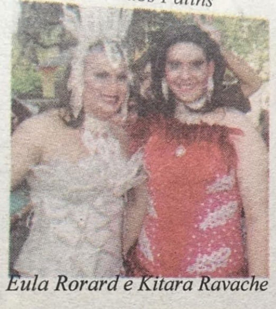 Santos is reportedly on the right and had the drag name “Kitara." 