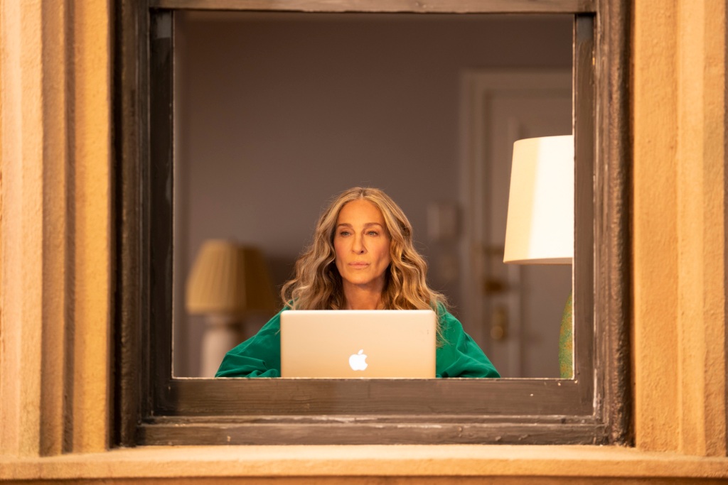 Sarah Jessica Parker's character, Carrie Bradshaw, will return to her famed Greenwich Village apartment — apparently with Aidan (John Corbett) in tow.