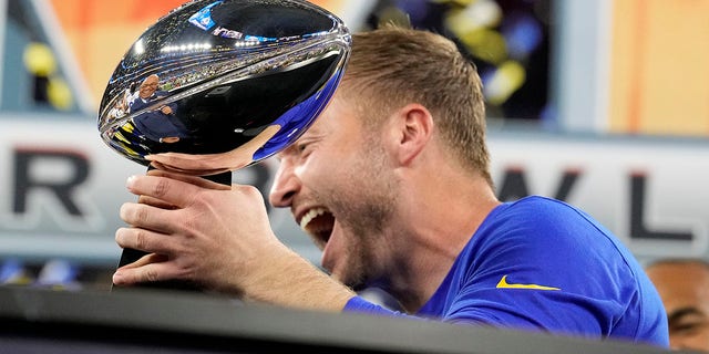 Head coach Sean McVay of the Los Angeles Rams holds the Lombardi Trophy after the Rams defeated the Cincinnati Bengals 23-20 in the Super Bowl at SoFi Stadium in Inglewood, Calif., Feb. 13, 2022.