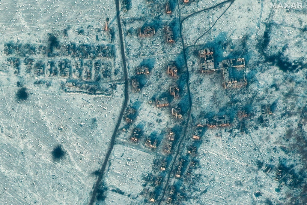 This undated satellite image provided by Maxar Technologies on Tuesday shows the damage to buildings in Soledar.